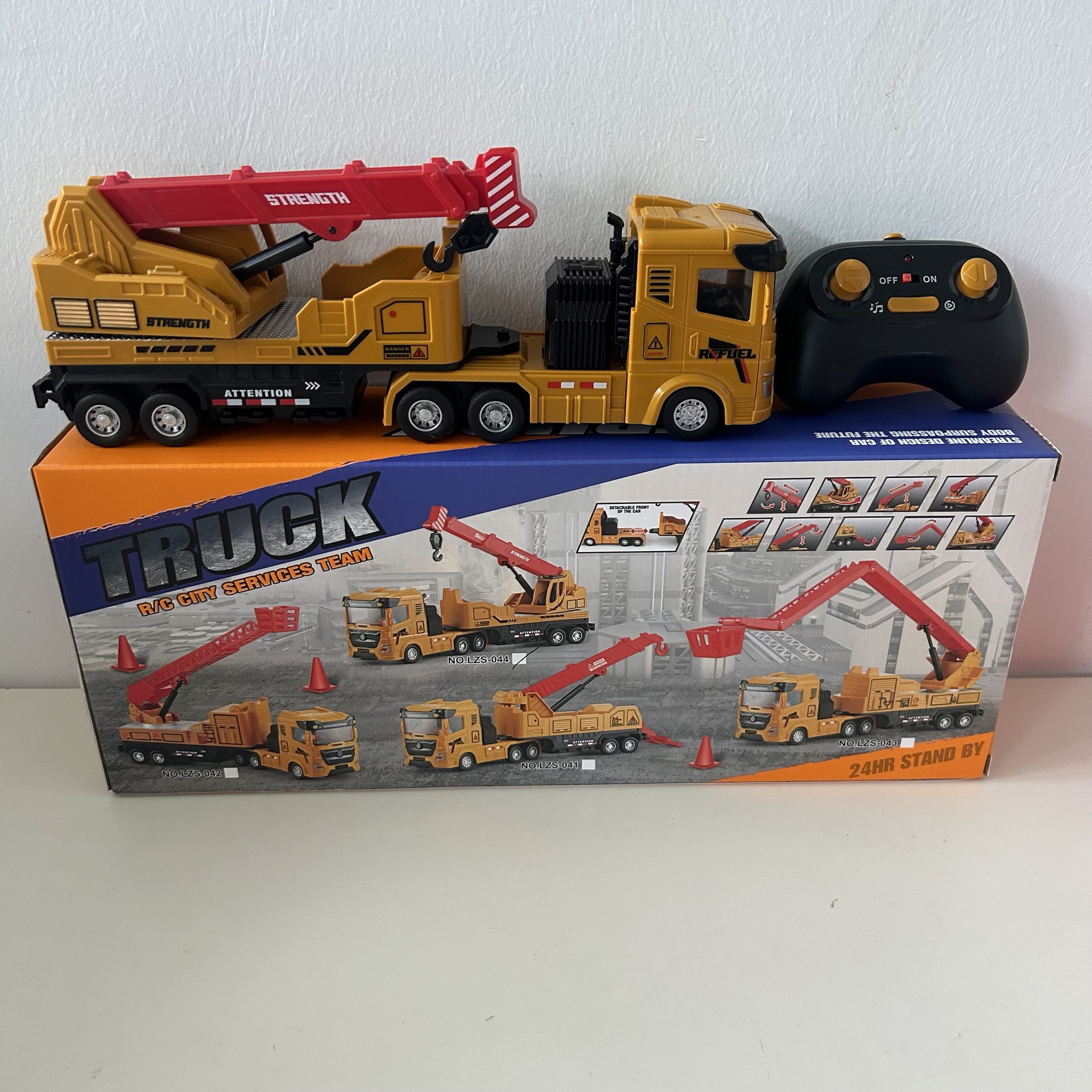 Wal-Mart al por mayor con luces y música conjunto de automóviles de control remoto Amazon transfronterizo grúa infantil coche de juguetes