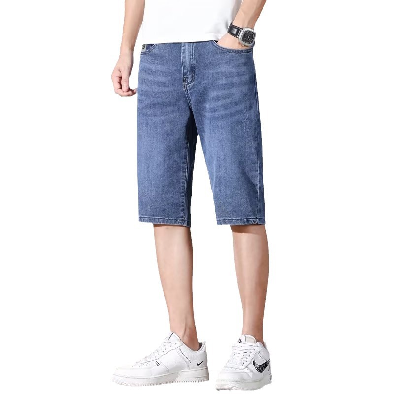 Pantalones de cinco puntos casuales elásticos de verano fino de los hombres de moda de mezclilla 2023