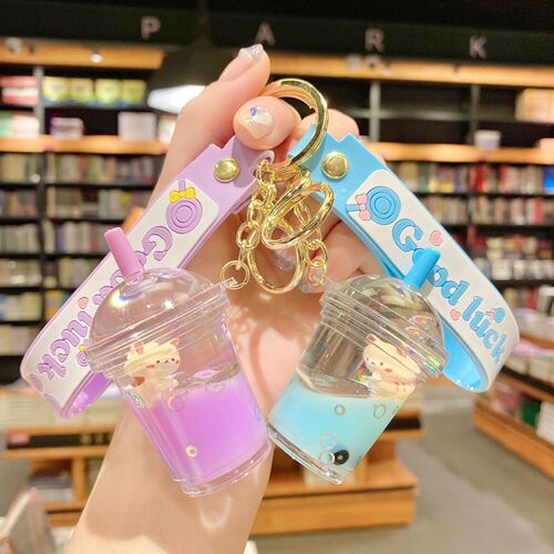Internet celebrity cartoon oil floating pearl milk tea bear keychain female cute trendy car key chain school bag pendant
