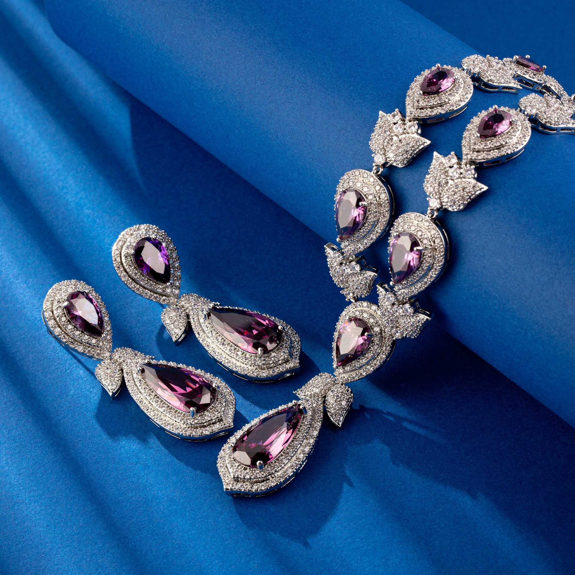 Close-up details of tulip crystal necklace and earrings set