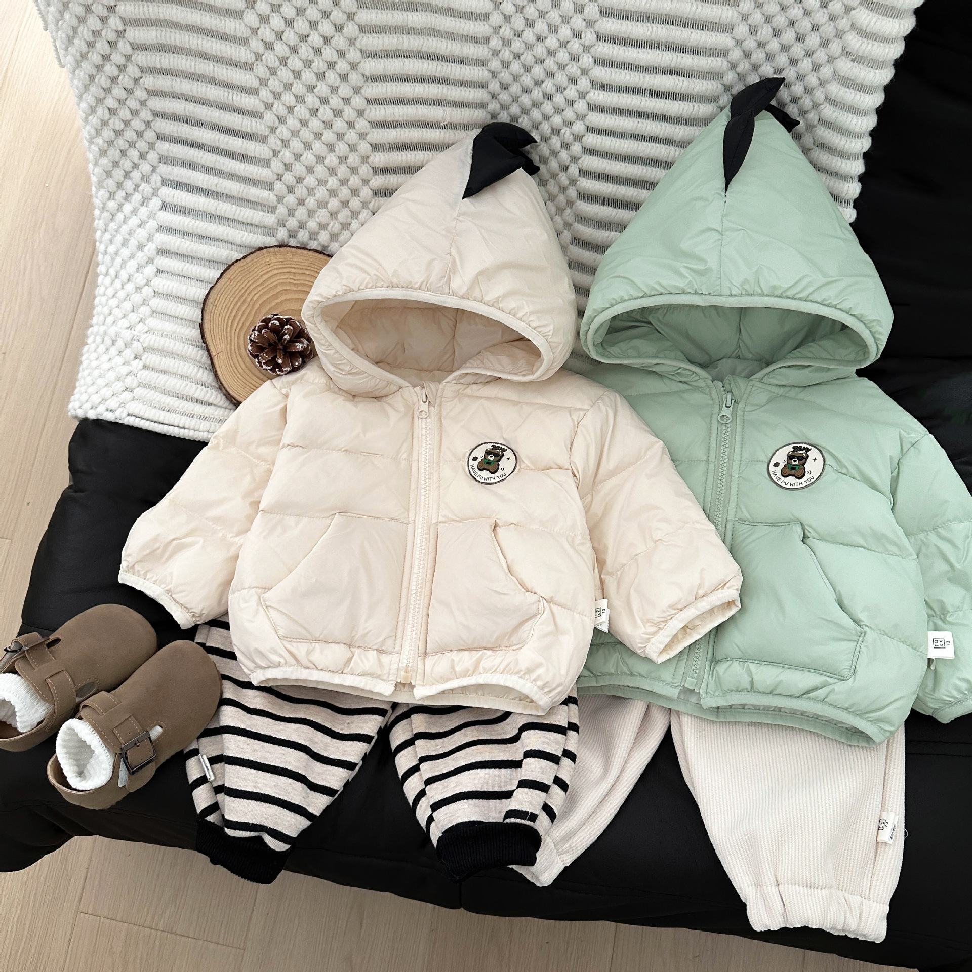 Ropa infantil coreana chaqueta de plumón para niños invierno de aire extranjero chaqueta con capuchón para bebés y bebés con capuchón blanco para calentar aire extranjero