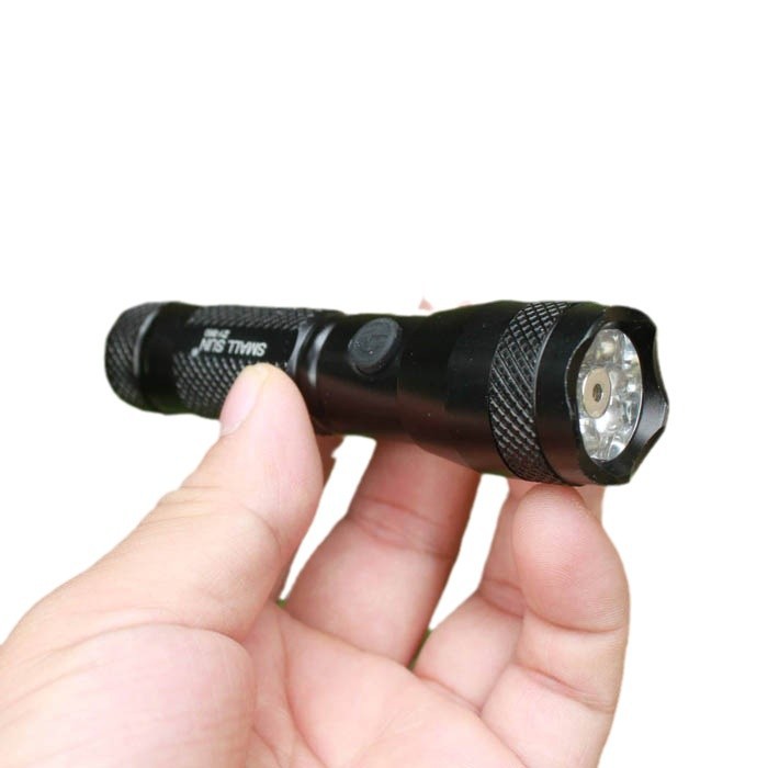 Linterna de luz brillante Una batería de 5 ª 7 LED+ láser rojo 2 en 1 Linterna (sin batería) image 5