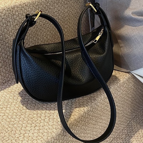 Bolsos retro bolsos nuevos bolsos de albóndigas de moda para mujeres bolsos ligeros bolsos de hombro bolsos de axilas simples hombro cruzado invierno