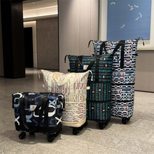 带滑轮万向轮旅行包女手提超大容量轻便折叠拉杆行李包购物行李袋