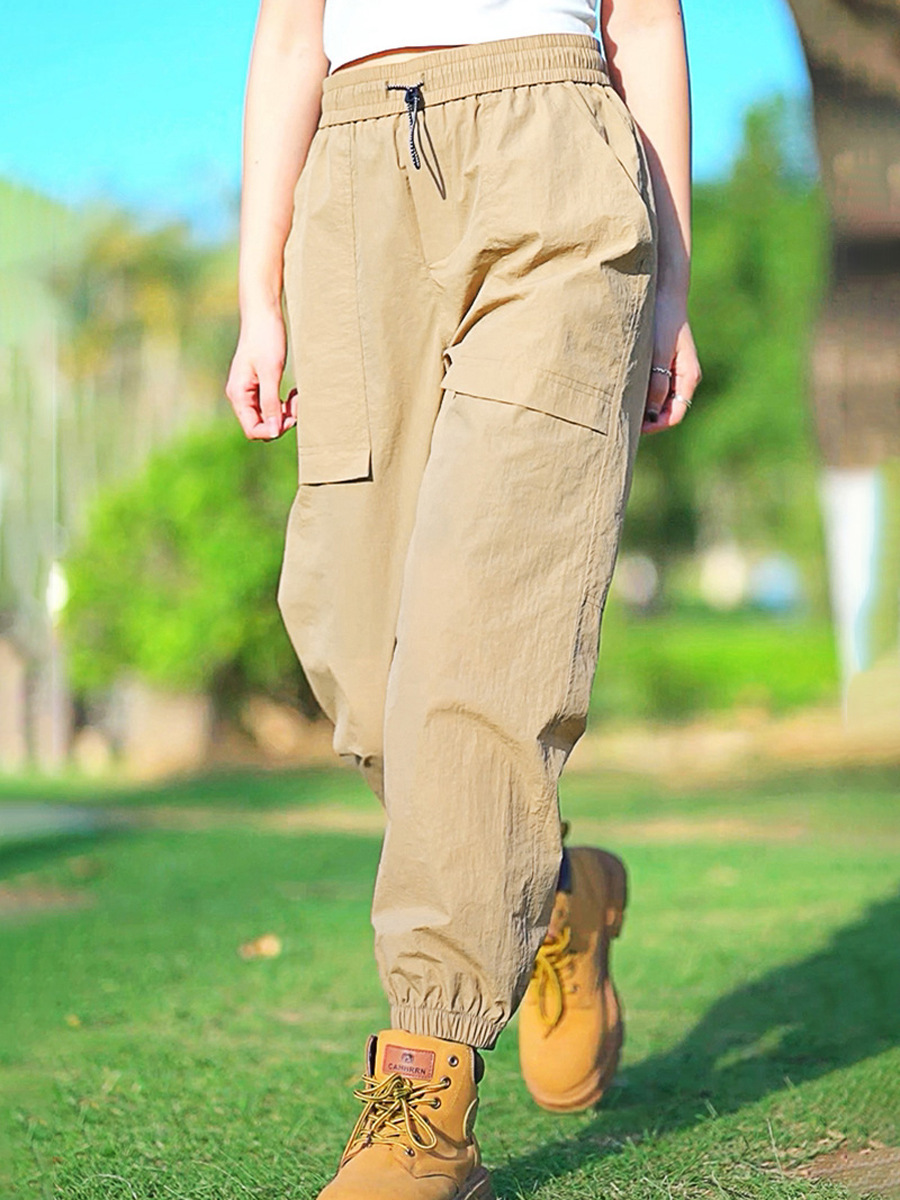 Fábrica directa de pantalones secos rápidos para hombres y mujeres de verano nuevos pantalones ligeros y transpirables parejas sueltos de pies deportivos casuales de nueve puntos