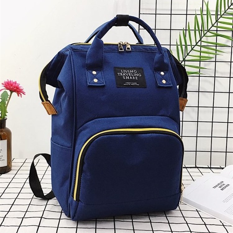 Bolsa de momia de fábrica de gran capacidad mochila de moda multifuncional bolsa materna e infantil nueva botella de alimentación de maternidad mochila de pañales al por mayor