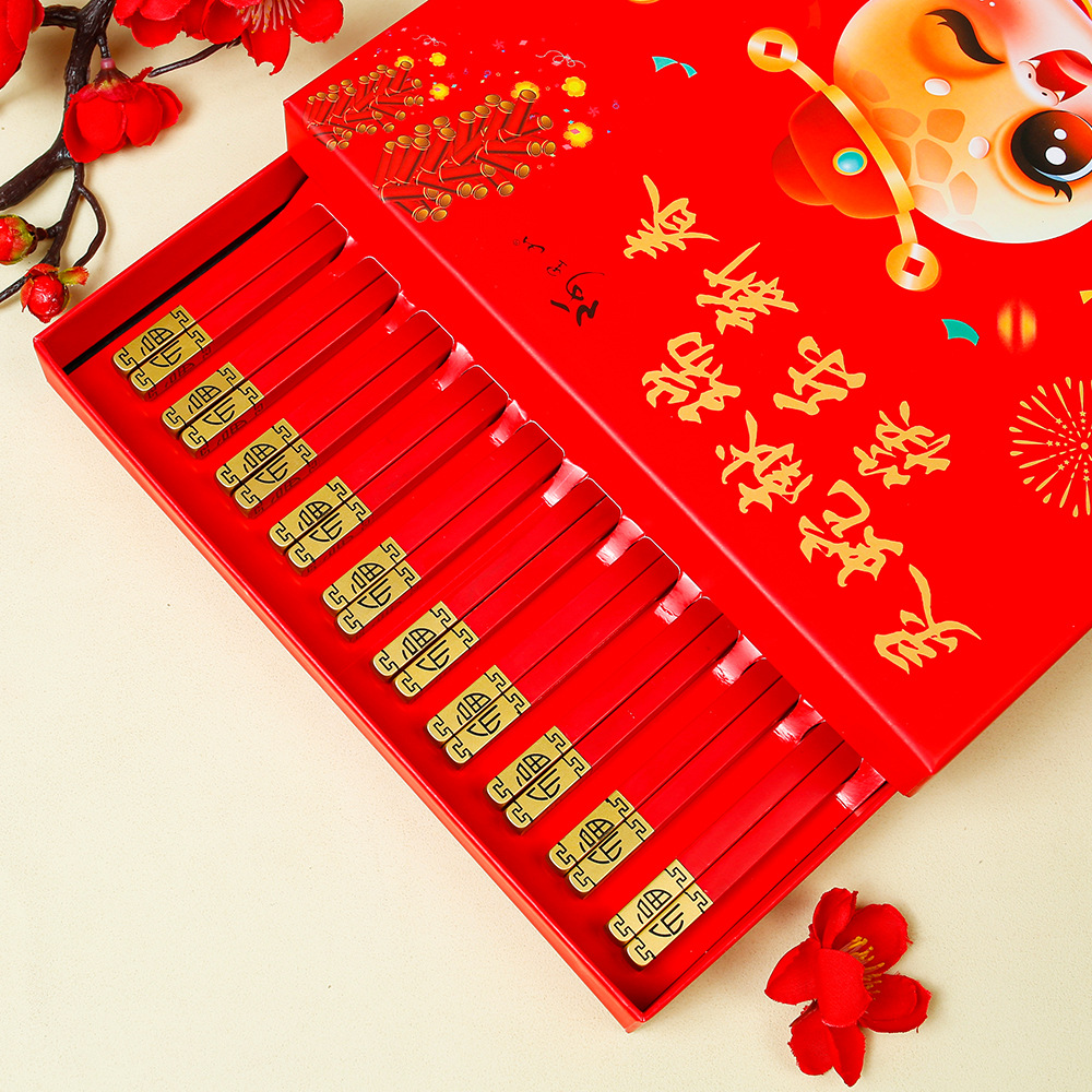 Un buen comienzo para el año de la serpiente 2025 regalos palillos zodiaco caja de regalo juego de vajilla doméstica de marea nacional con regalo LOGO al por mayor