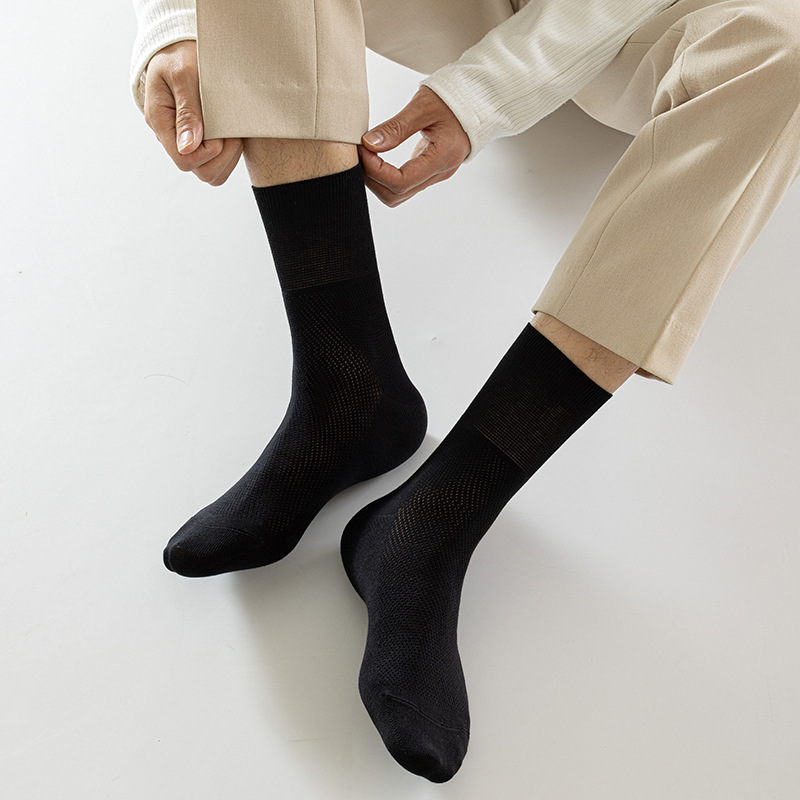Calcetines de algodón de color sólido para hombres de malla primavera, verano y otoño en una máquina sin hueso anti-balling embalaje independiente de calcetines de algodón