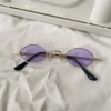 Large oval, gold frame, purple lenses