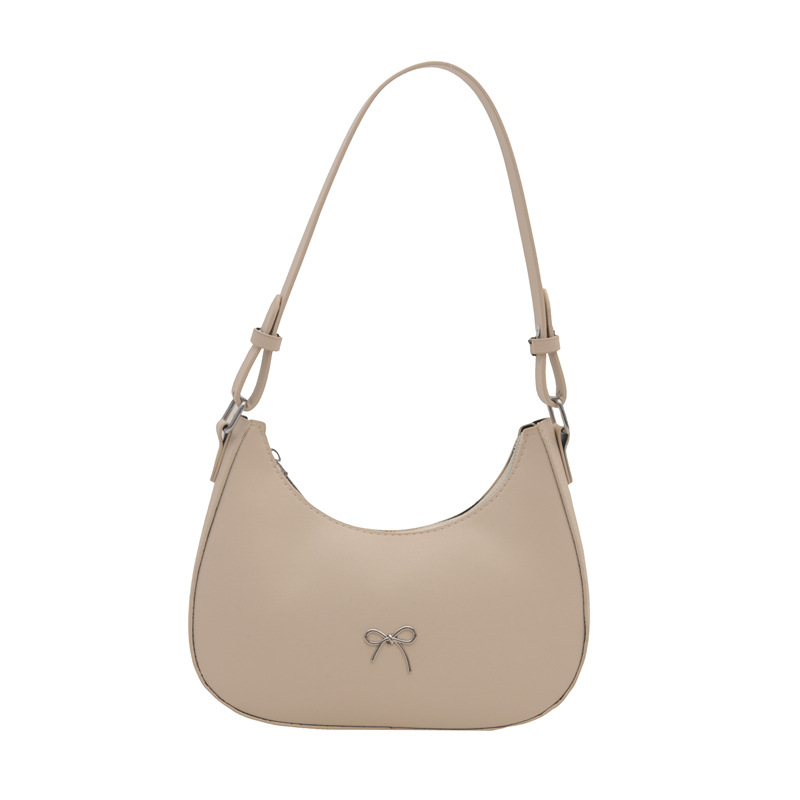 Bolso de axila con lazo para mujer 2024 nuevo estilo literario minimal bolso de hombro textura de viaje de moda de luna nueva marea