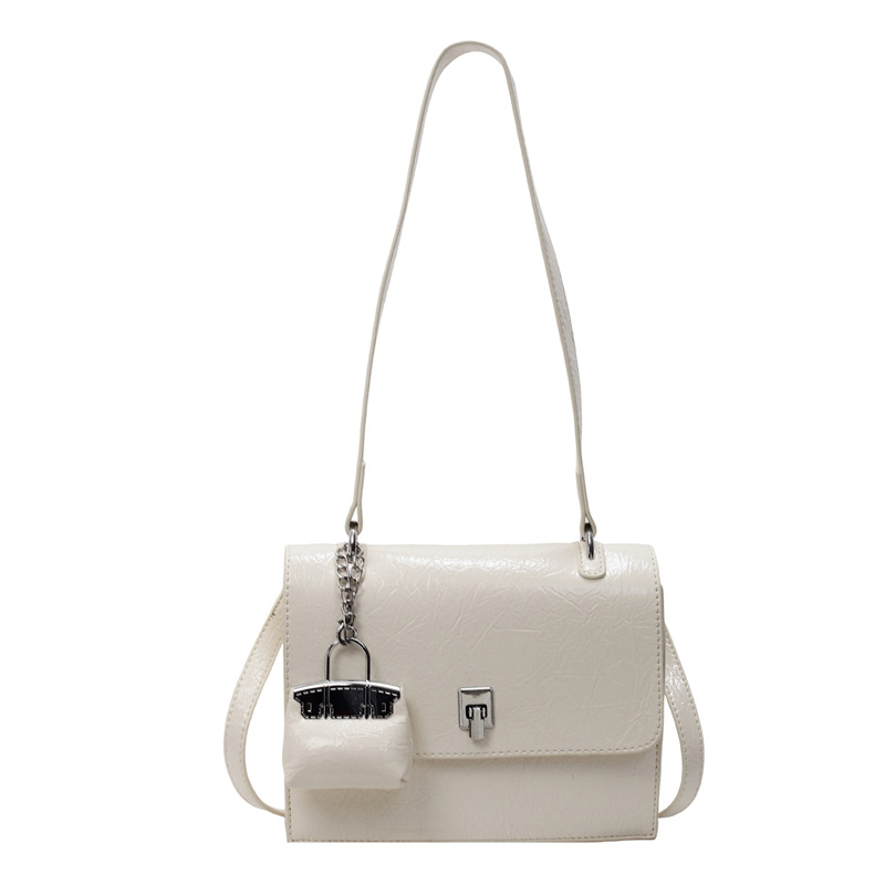 Bolso de textura transfronteriza 2025 primavera y verano nuevo bolso femenino bolso de hombro con patrón de agarre de mano de alta gama bolso de mensajero simple y versátil