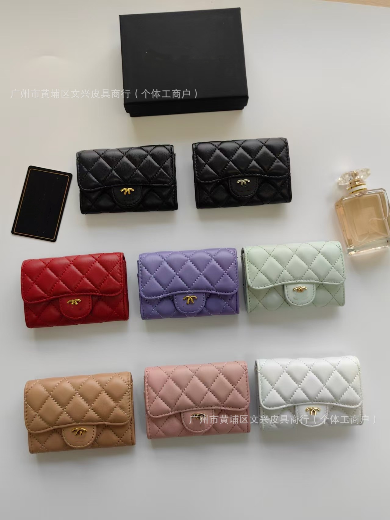 Cartera de cuero corta de diamante de alta calidad, nicho casual, gran capacidad, exquisita, pequeña bolsa de cambio de hebilla fragante.