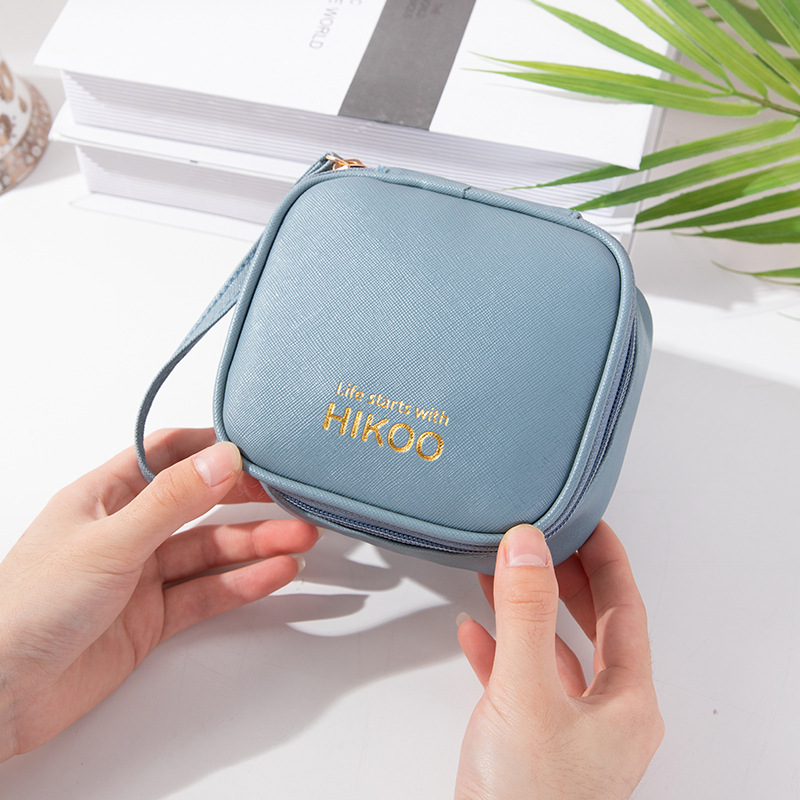 Gran capacidad portátil Mini tía toalla bolsa de almacenamiento mensual sanitaria servilleta bolsa de almacenamiento monedero femenino lápiz labial bolsa de almacenamiento