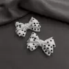 With bow, white