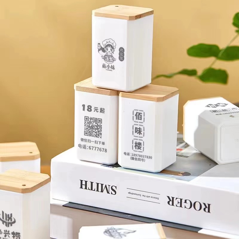 Nuevo tipo de publicidad caja de palillos de dientes restaurantes de alta calidad plástico blanco puro Nan cubierta de madera palillos de dientes al por mayor puede imprimir LOGO