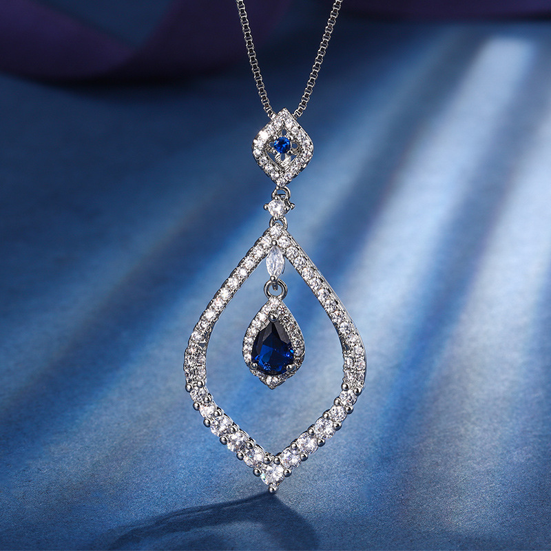 2023 Nueva Zhuang Sheng joyas de cobre inferior chapado en oro de la simulación de color tesoro gota de agua traje de temperamento de piedra principal 5*7