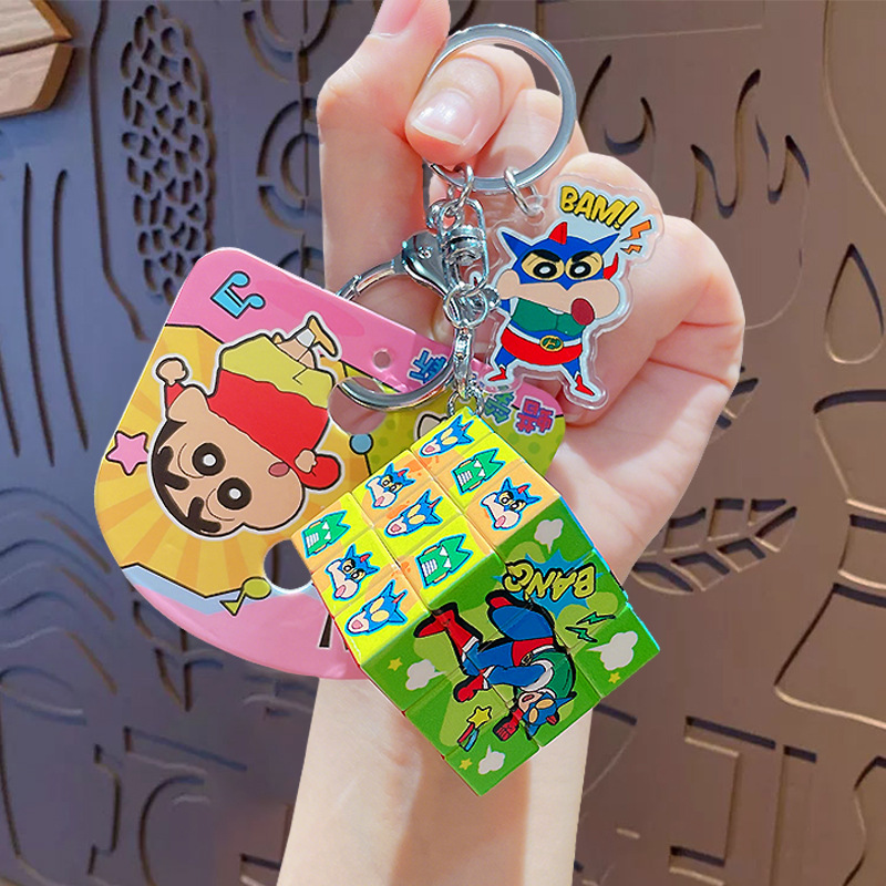 Crayons, Rubik's cube, keychain, Superman