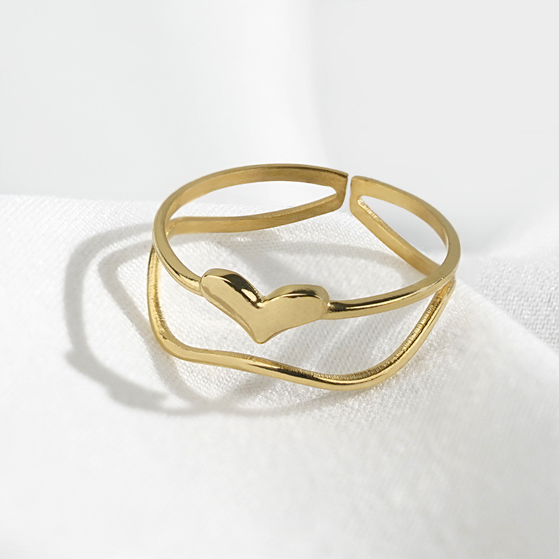 Minimalistic wavy design golden glossy ring heart-shaped stainless…