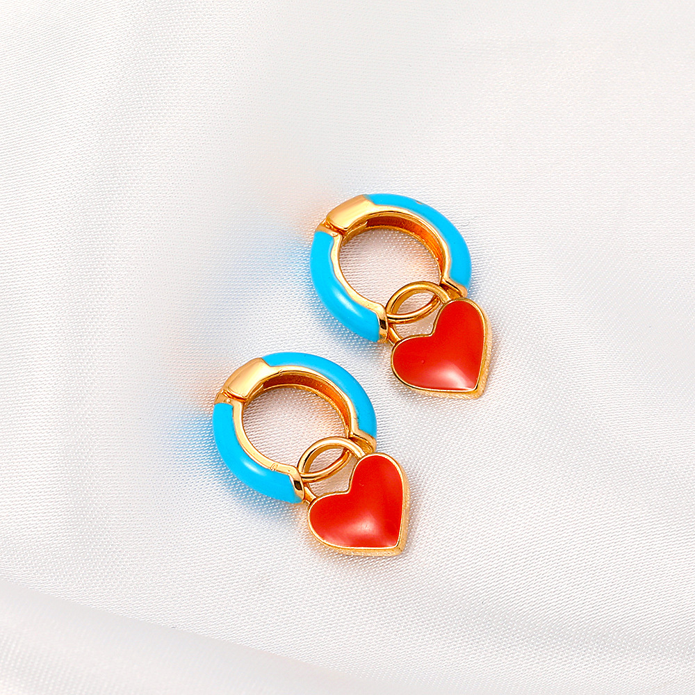 European And American Fashion Colorful Geometric Earrings Simple Alloy Dripping Heart Ear Clip Ins Cold Style Peach Heart Stud Earring Women display picture 7