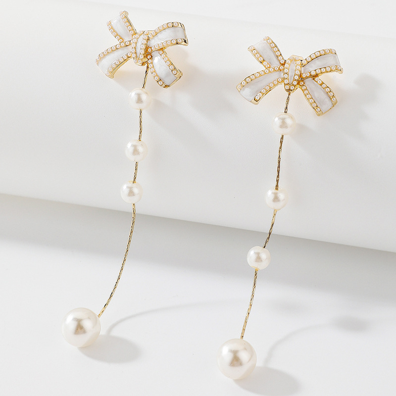 925 Silver Needle Drop Oil Bow Pearl Tassel Earrings Two-wear High-quality Earrings display picture 5