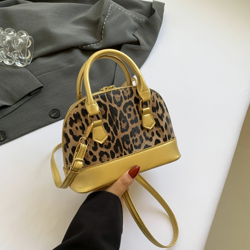 Tendencia simple de moda bolso de hombro de verano 2024 nuevo estilo simple de moda conchas bolso de estilo casual de moda mochila