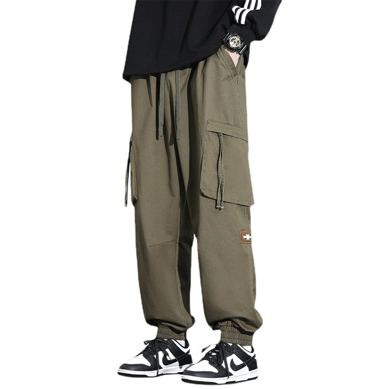 Nuevos pantalones de trabajo de alta calidad de primavera para hombres, moda multibolsillos con tendencia universal
