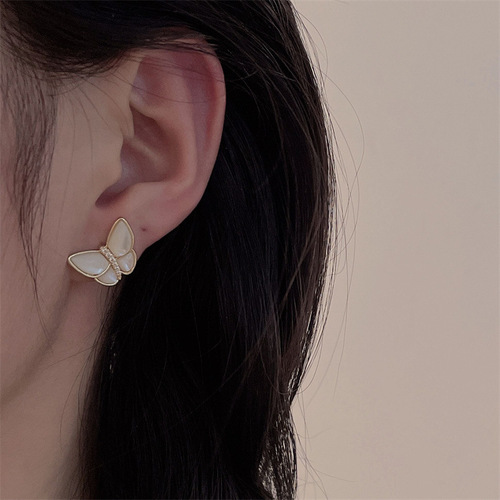 Fashionable and versatile butterfly love tassel shell earrings women's high-end temperament geometric flower earrings wholesale