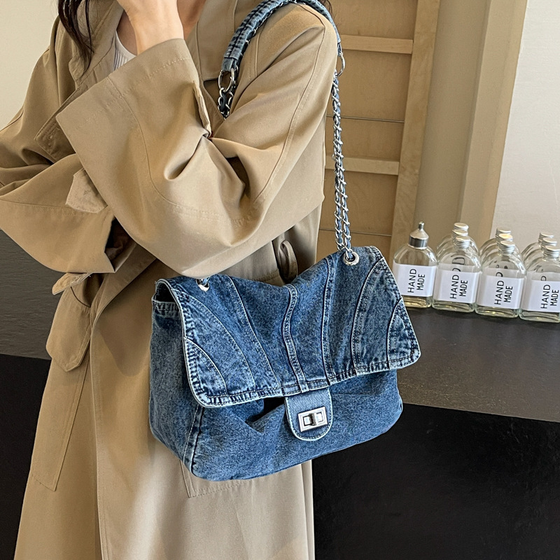 2024 nueva moda super fuego casual señoras bolso de hombro cadena de gran capacidad tirada diagonal bolso femenino al por mayor