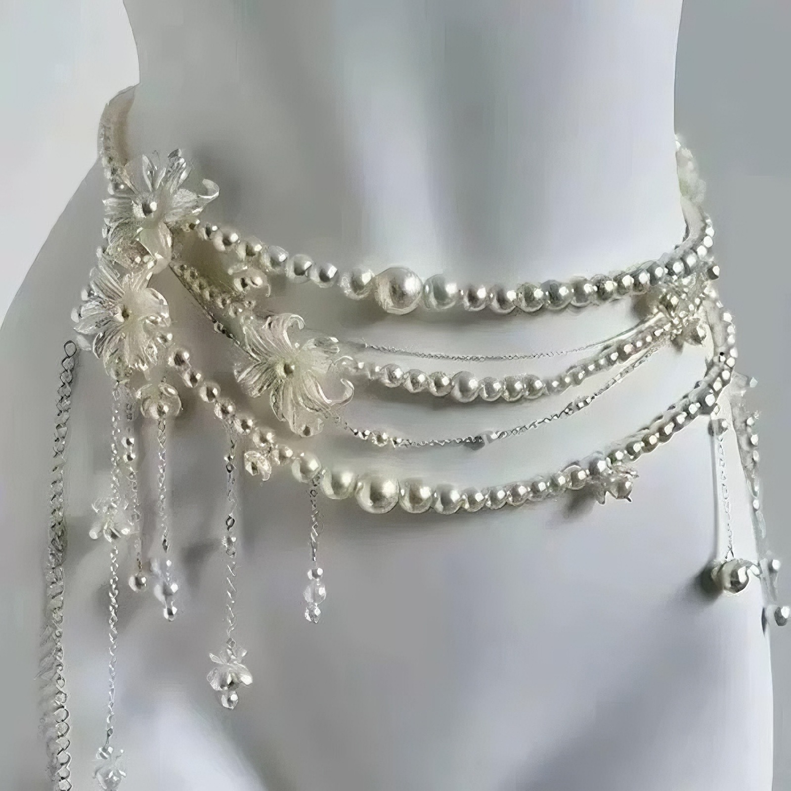 Luz lujosa y sexy flor perla cintura multicapa cadena de moda alta personalidad nicho temperamento combinado cintura mujer