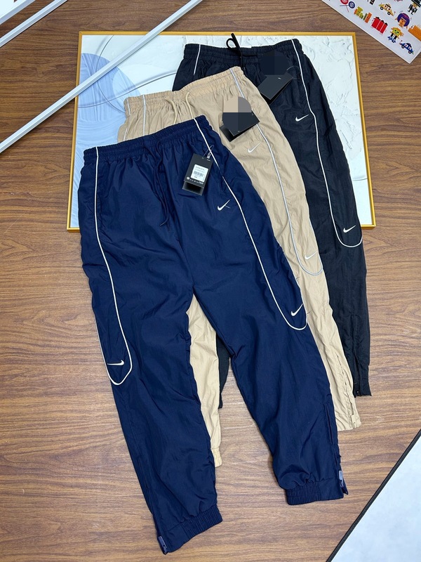 秋海外爆款NK联名男士休闲裤 跨境钩子刺绣反光条休闲情侣运动裤|undefined