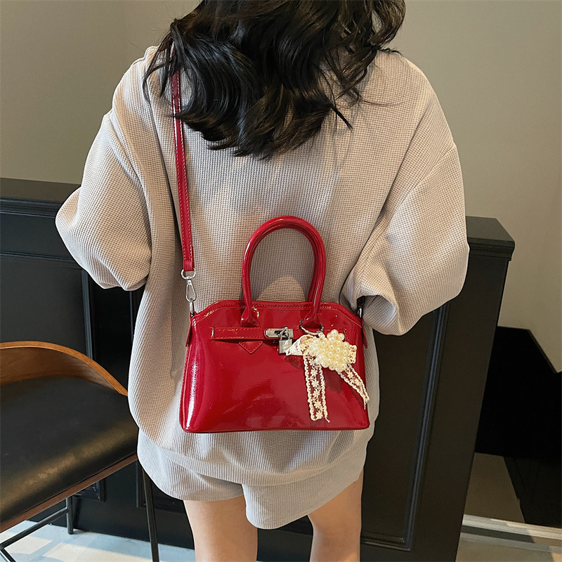Bolso de concha de moda de verano transfronterizo para mujer 2025 nuevo bolso de hombro de estilo occidental de todo fósforo bolso de mensajero de moda de alta gama