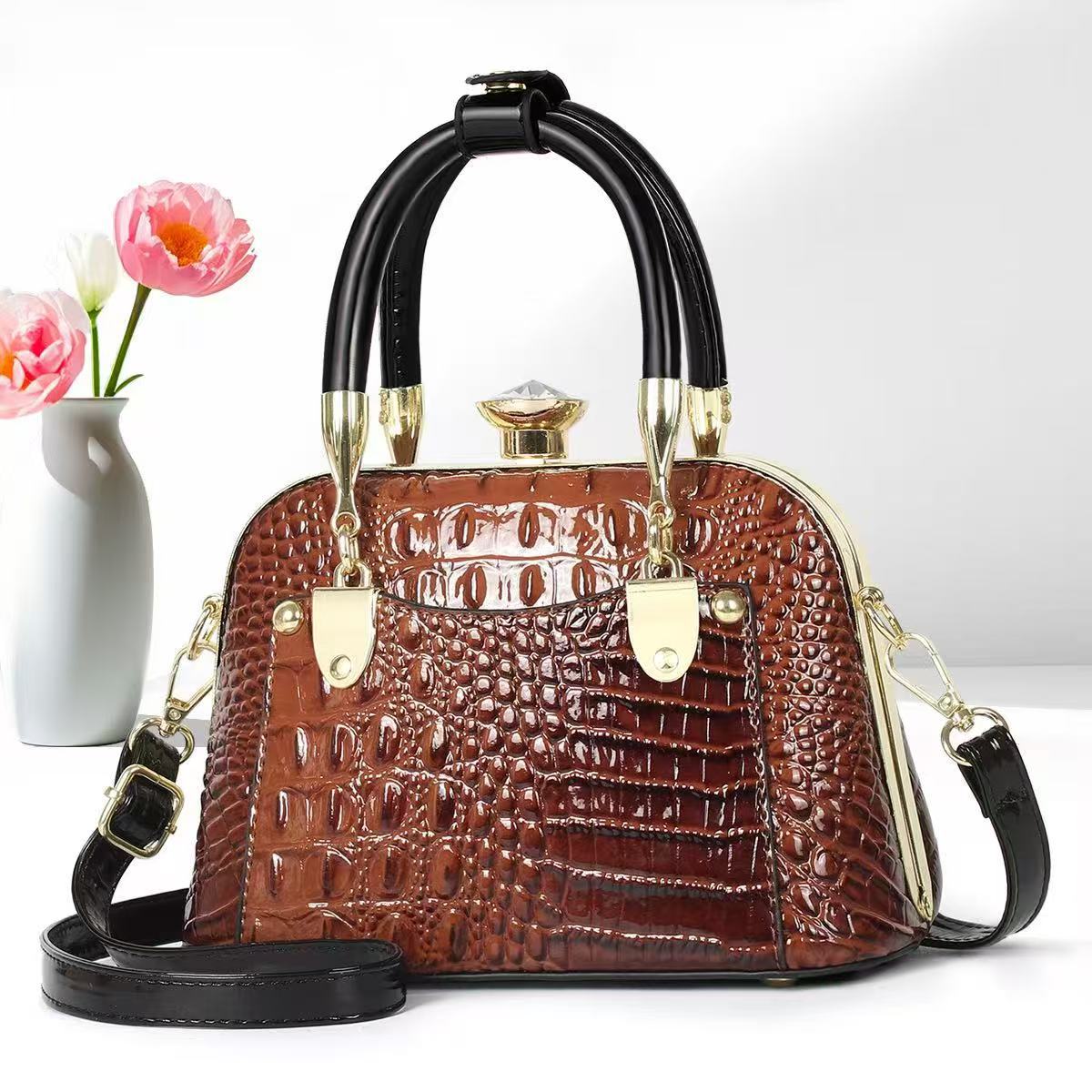 Bolsos de mujer verano nuevo estilo bolso de madre bolso de hombro de mediana edad bolso de mensajero de nicho de regalo de todo fósforo