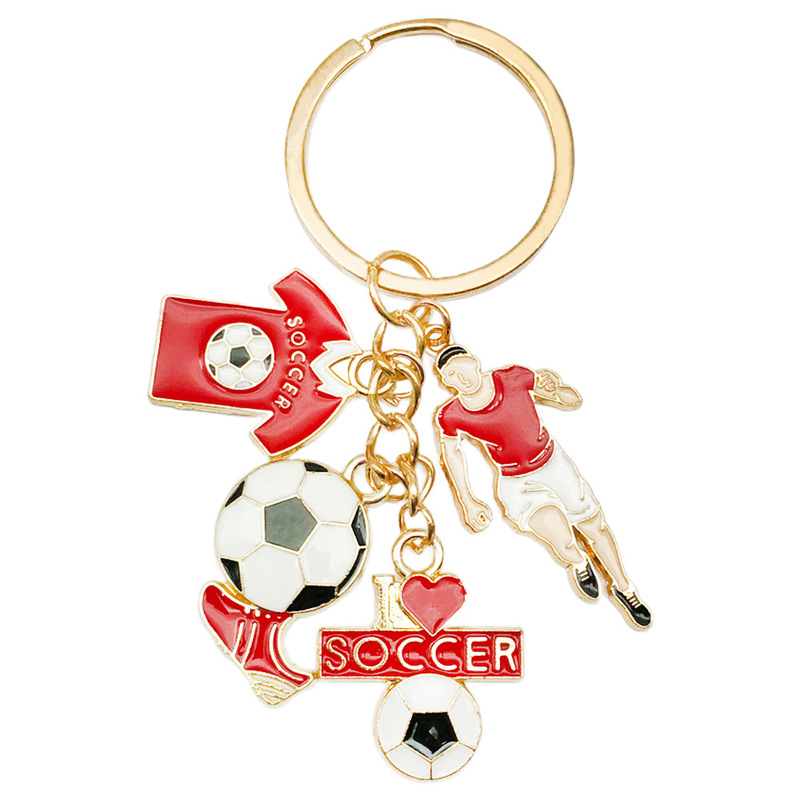 国境を越えてよく売れています。サッカー選手のユニホーム靴のキーホルダーは金属部品のワールドカップの周辺プレゼントです。|undefined