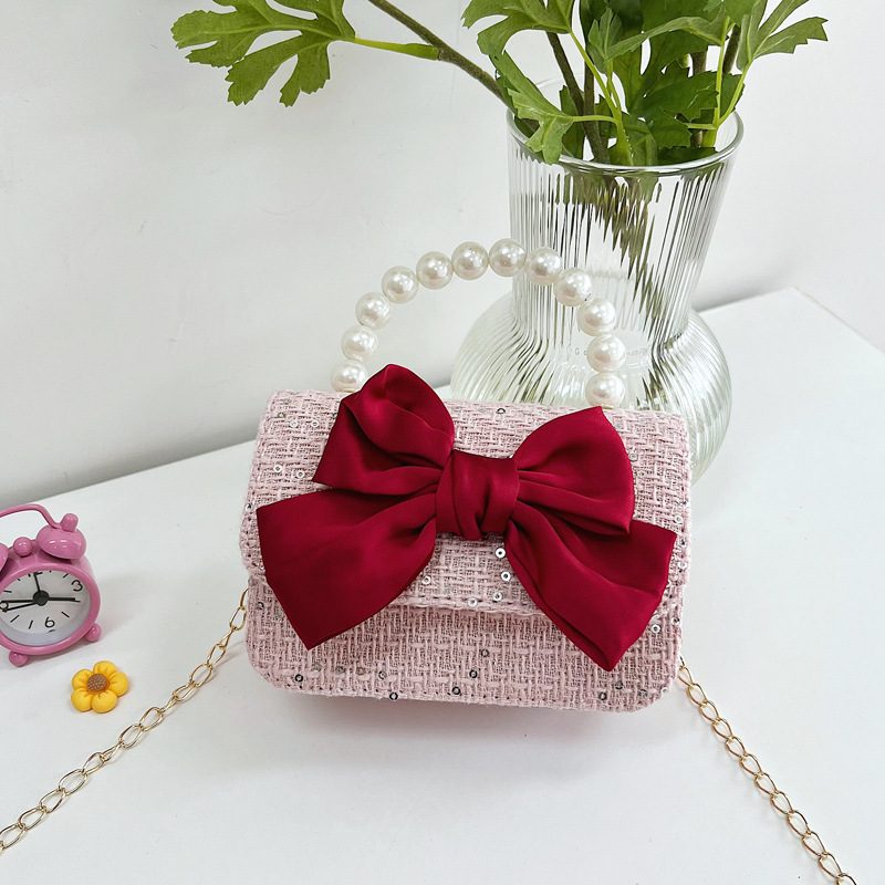 Bolsos infantiles, bolsos de arco, bolsos de moda, bolsos de princesa, bolsos de hombro para niñas, bolsos de cambio para reducir la carga