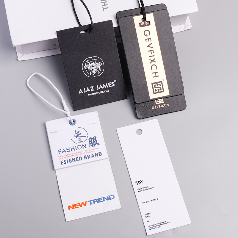 衣服吊牌pvc挂牌定 做设计童装男女装服装杜邦纸触感纸烫金吊牌