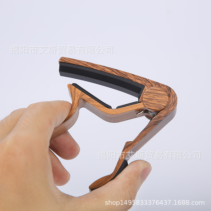 Capo guitarra capo guitarra grano de madera aplicable acústica guitarra eléctrica ukelele accesorios transfronterizos