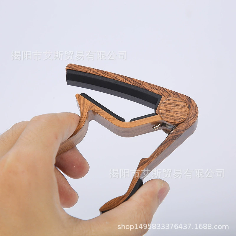 Guitar capo, wood‑grain finish, for acoustic/electric guitar and ukulele, with picks/tuner options