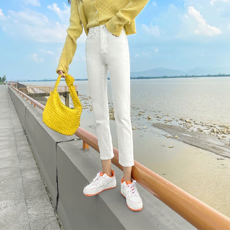 一枚の卸売り代の夏杏色のジーパンの女性の弾力性のまっすぐな筒の春の高い腰の修身はやせているパイプの9分を現します。|undefined