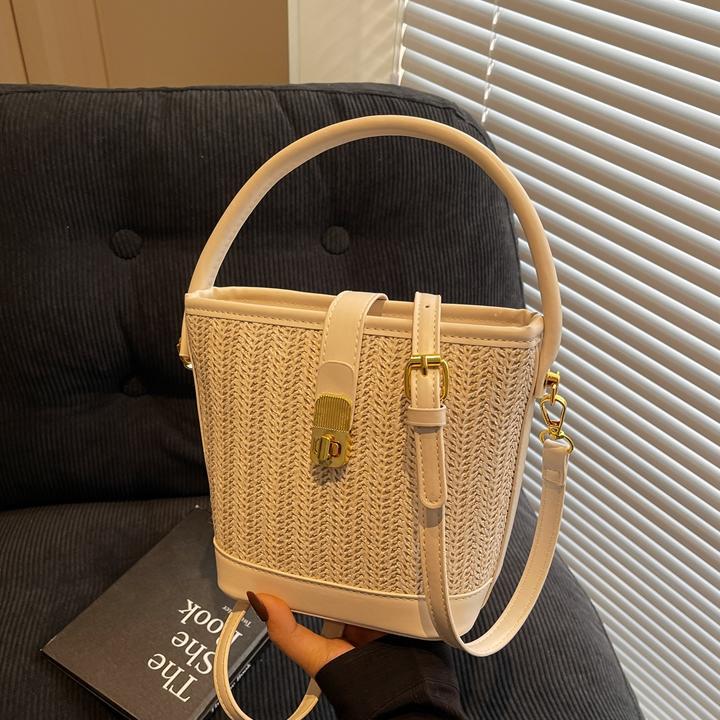 Bolsa de mano de tejido de verano super caliente para mujeres 2025 nuevo bolso de playa de vacaciones de alta calidad bolso de cubo de ocio