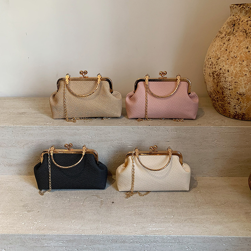 Bolsos de cadena de moda para mujer 2025 primavera nueva tendencia simple bolso de concha de un solo hombro bolso de mensajero casual bolso femenino