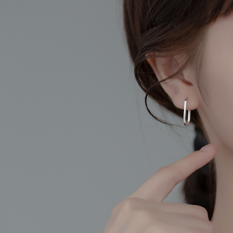 Eloch s925 plata hueco elíptico brillante auriculares coreano simple pequeño fresco lote de auriculares de verano M00457