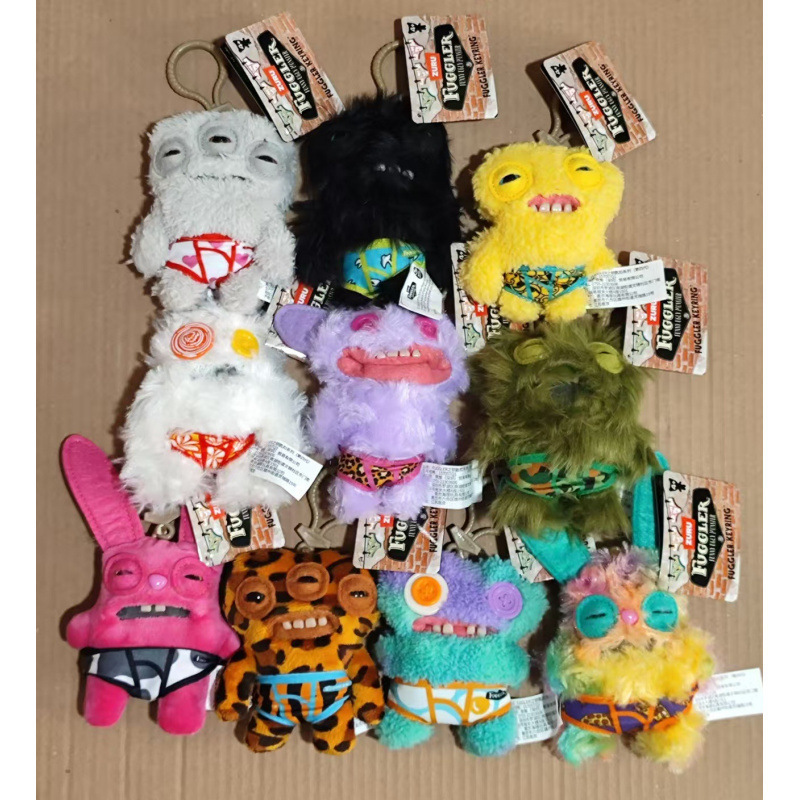 Colgante de llaves de dientes grandes genuinos, muñecas de monstruos de dientes, monstruos de dientes, monstruos feos y lindos, soporte de peluche extraño para una generación.