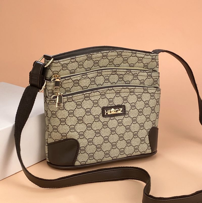 Guangzhou Hengli equipaje para mujer 2025 nuevo estilo coreano bolso de mensajero de un solo hombro bolso de cubo madre de mediana edad bolso de varias capas mujer