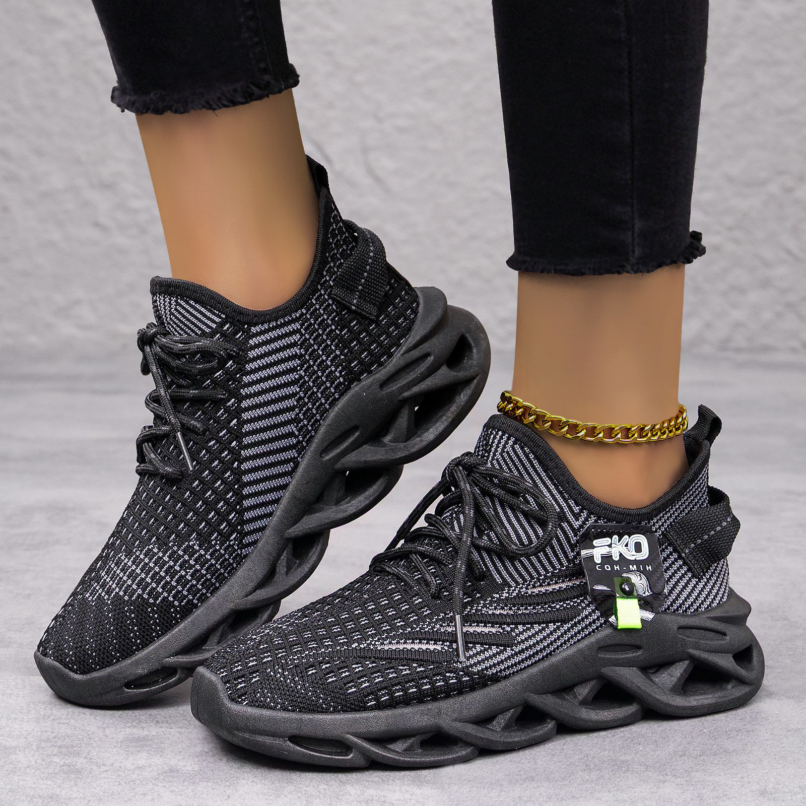 Zapatos de pareja de mujer zapatos de coco transfronterizos grandes cuchillas de torsión zapatos deportivos casuales de tejido aéreo zapatos transpirables