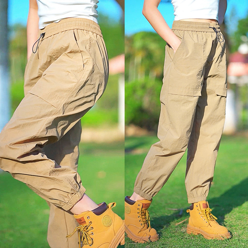 Fábrica directa de pantalones secos rápidos para hombres y mujeres de verano nuevos pantalones ligeros y transpirables parejas sueltos de pies deportivos casuales de nueve puntos