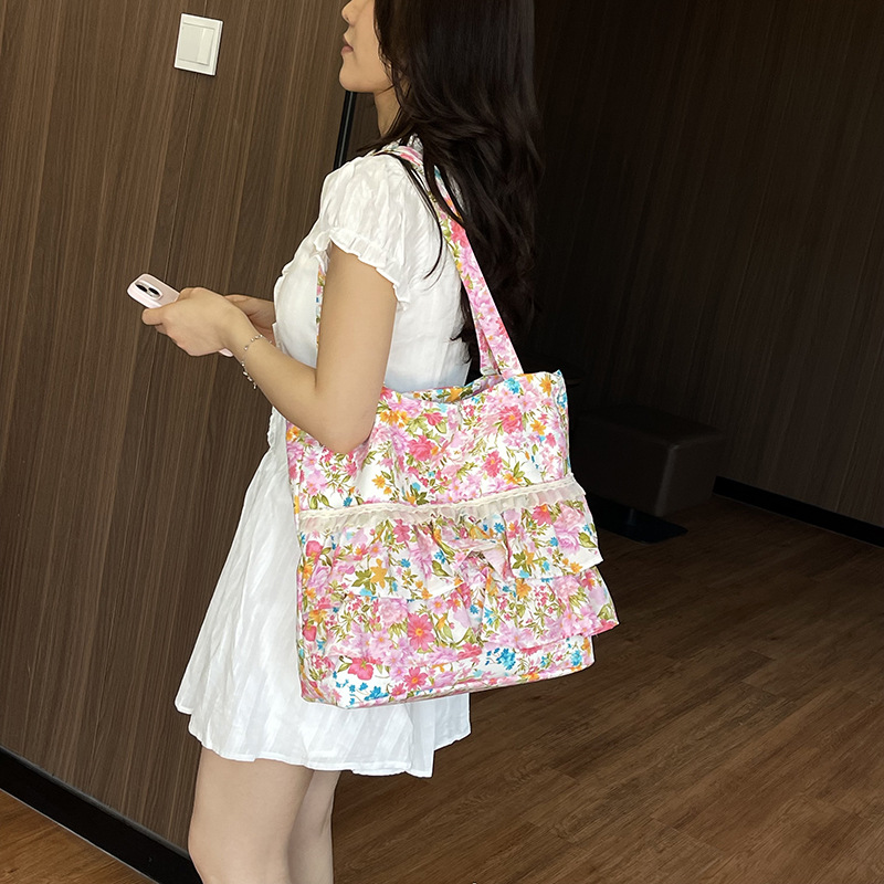 Bolsa de lona de flores coreana diaria para mujeres verano 2026 nueva moda encantadora niña brazo bolso de hombro