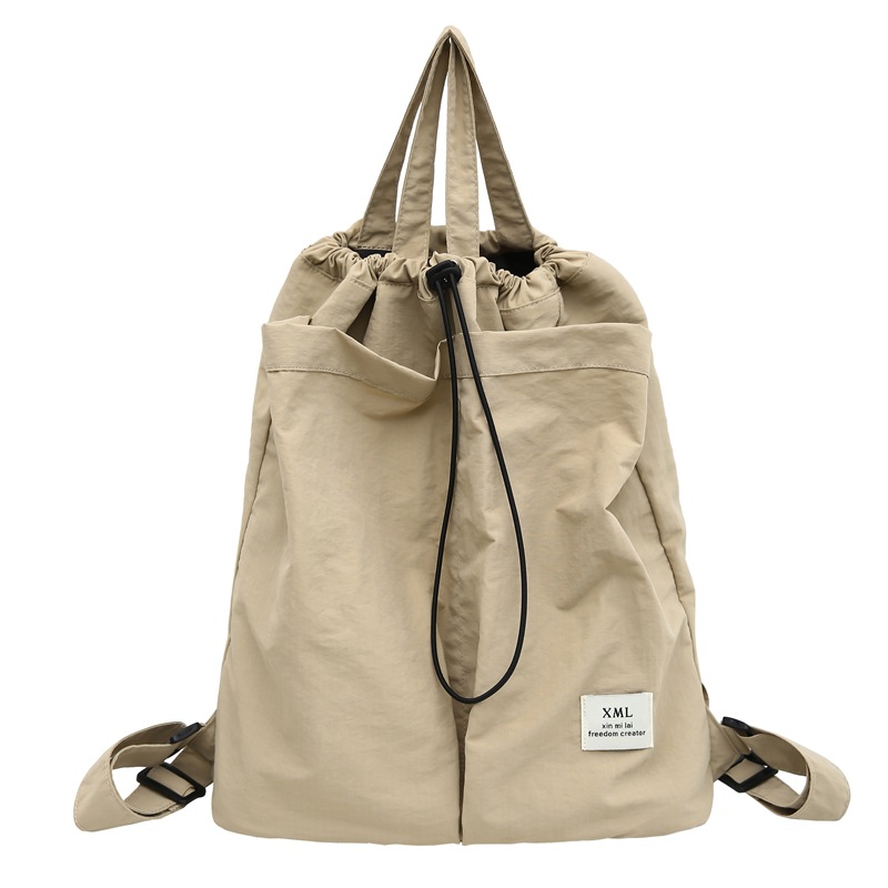 2024 nueva mochila anti-salpicaduras de nailon japonés de nicho, mochila ligera para estudiantes universitarios, mochila de gran capacidad