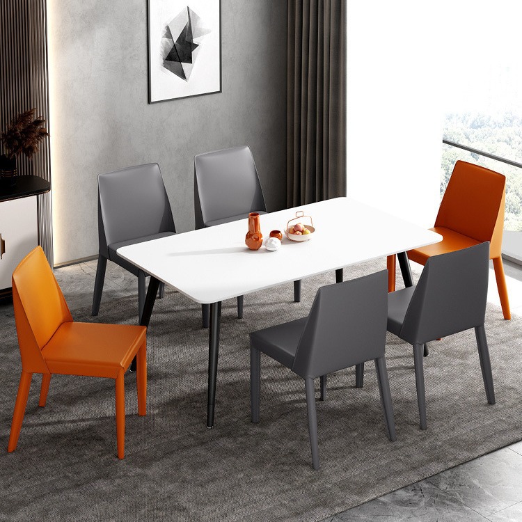 Mesa y silla de comedor de comedor moderno y simple, silla de cuero de diseño respaldo, silla de silla de aire industrial, exportación gruesa y minimalista