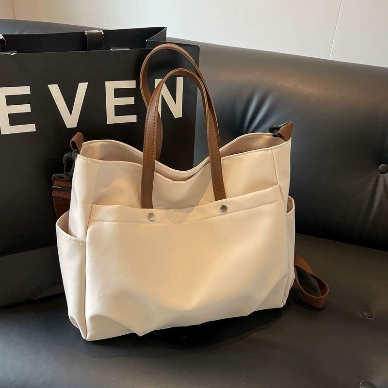Universal laptop, handheld capacious purse one shoulder