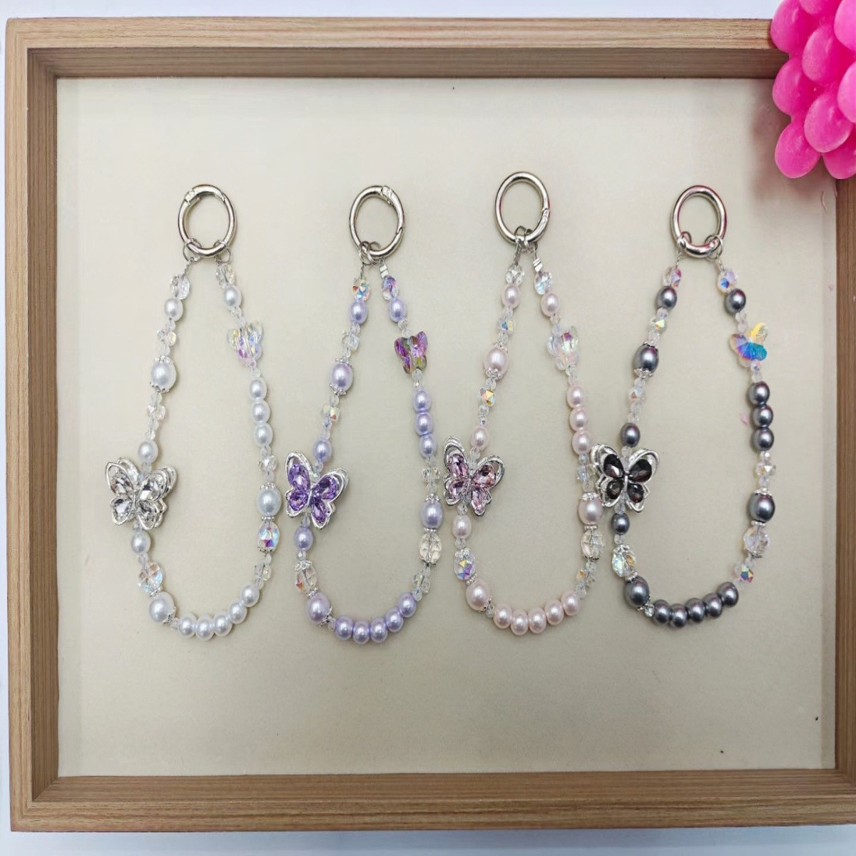 Nueva aleación de mariposa de diamantes de alta calidad, cuentas de colores de cinco estrellas, cadena de teléfono móvil, bolsa de coche, colgante corto, cordón al por mayor